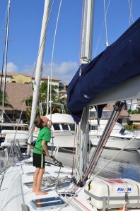 Camden shaking the halyard to scare the birds away DSC_0100